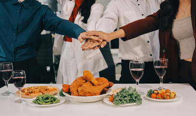 Diversity, dinner and group of people toast celebration together at party. Friends, happy and celebrate with food, wine and friendship for love, support and cheers champagne at business function