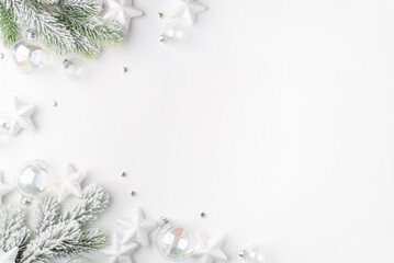 Festive Christmas ornaments on a white background.