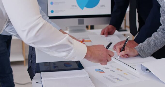 Business people standing at the desk discussing company finance growth with brainstorming analyzing data stat. Company employees working on a meeting together. Teamwork concept. 4k video. - Powered by Adobe