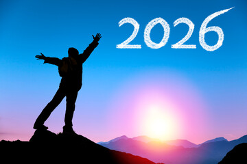 Happy new year 2026 concept. man thinking felling ambitious empowerment energy vision on moutain background.