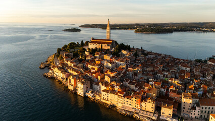 Rovinj Old Town at Sunset, Istria, Croatia &ndash; Scenic View of Red Rooftops, Adriatic Sea and Charming Mediterranean Streets in Golden Evening Light. Aerial View