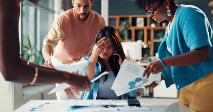 Business people, stress and overwhelmed in office with paperwork, meeting and proposal in agency. Chaos, deadline and graphs with multitasking, document and burnout with discussion and busy staff