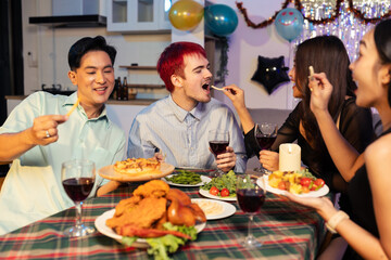 Drinks and conversation, social gathering and get together. Young people, eating pizza and...