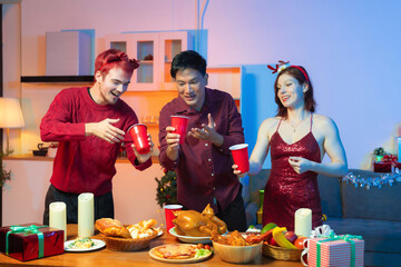 drinks and conversation, social gathering and get together at New Year young people, group and gift...