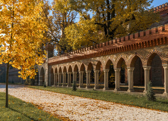 The palace colonnade in autumn scenery. Kamieniec, Poland.