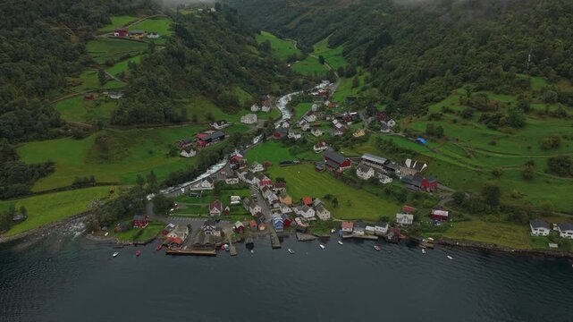 Aerial view of scenic Undredal on the fjord edge surrounded by Norwegian mountains