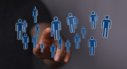 Hand interacting with digital interface showing social network connections and people icons representing teamwo