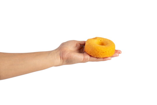 Yellow round donut in hand on transparent background
