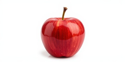 Shiny red apple with a stem on a white background.