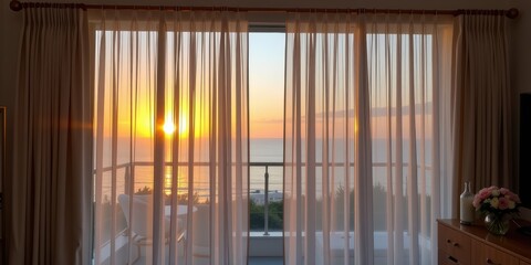 Sunset view through sheer curtains, overlooking the ocean from a cozy interior.