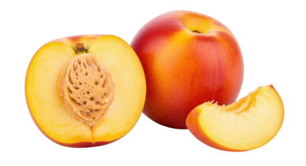 Isolated closeup of cut peach, fresh and ripe, with pit, showing a slice of delicious fruit