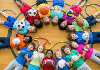 Diverse group of children smiling while holding sports equipment on a gym floor