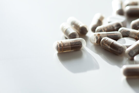 Clean composition with vitamins and capsules. A minimalist view of healthcare and nutrition.