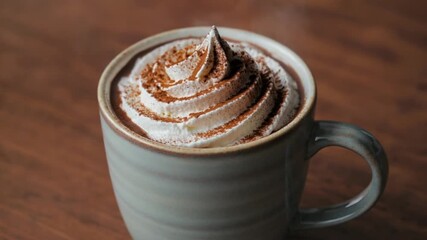 cup of cappuccino with cinnamon - Powered by Adobe