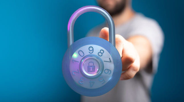 A person offers a padlock icon for cybersecurity and data protection concept. Cybersecurity technology, digital safety, and safe onli