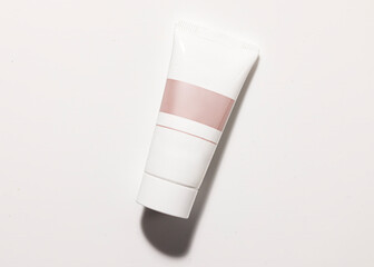 cosmetic cream in a transparent package on a white background. top view with copy space