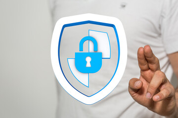 Concept of cybersecurity, data protection, and online safety. Person holding a shield and padlock symbol, representing secure access