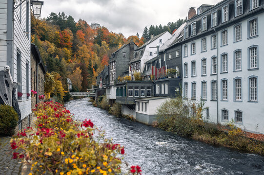 Picturesque Town Monschau with Historical Charm and the Tranquil Rur River in autumn