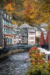 Picturesque Town Monschau with Historical Charm and the Tranquil Rur River in autumn © Oksana