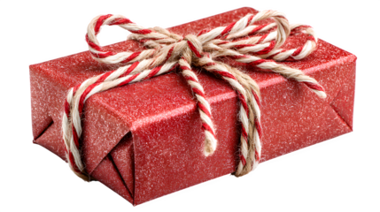 Elegant red present tied with striped festive cord symbolizing New Year joy isolated on white background