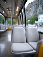 Fototapeta premium Empty tram seats with a view through windows.