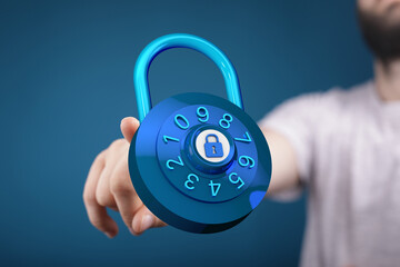 A close-up of a hand holding a blue digital combination lock, symbolizing security, data protection...