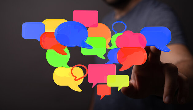 Abstract image of hand touching speech bubble icons representing connection, communication, and digital interac - Powered by Adobe