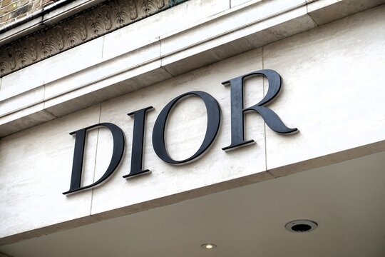 Sign for the Dior designer fashion store in Mayfair, London. Christian Dior SE, commonly known as Dior, is a French multinational luxury goods company.