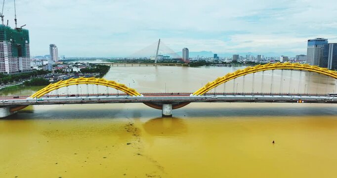 Aerial view of Dragon Bridge, beautiful bridge, structural elements which made the form of a fire breathing dragon is the crossing of the Han river in Danang, Vietnam