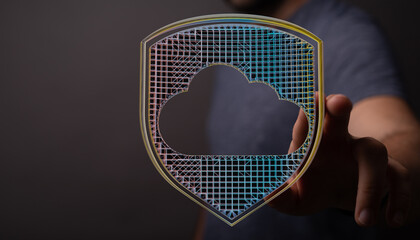 Hand holding cloud security shield graphic, concept for data protection, network safety, and online...