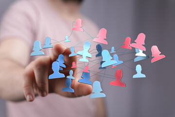Abstract image showing networking with people icons representing global connection and communication, teamwork, and social media