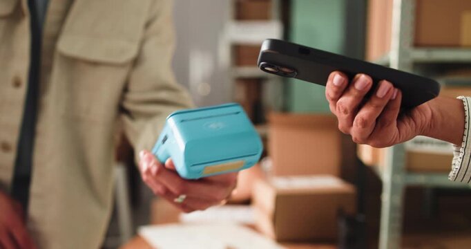 People, hands and pos machine with phone, box or delivery for payment, purchase or package in store. Closeup, customer and courier with NFC or parcel for wireless transaction or tap to pay in shop