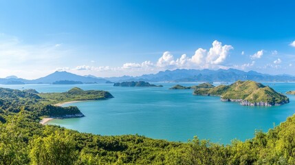 Obraz premium 120.Majestic panoramic view of Lan Ha Bay from Cat Ba Island, with towering limestone karsts rising from the emerald-green waters, surrounded by lush vegetation and distant islands under a bright