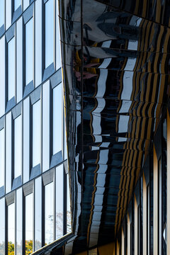 Rhythmic modern facade with geometry and architecture detail creating a structured pattern through reflection and texture within an abstract minimalist architectural study