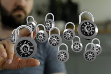 Concept of security, data protection, privacy, and technology represented by many padlocks with a hand reaching