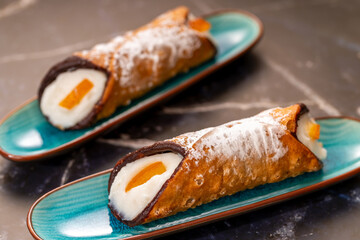 Sicilian cannoli dessert serving traditional Italian pastry on plates