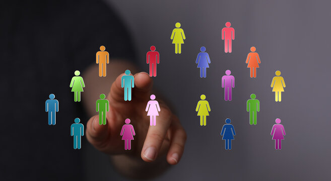 Hand reaching towards a network of connected human figures, representing diversity, community, and digital interaction. Promoting unity and glob