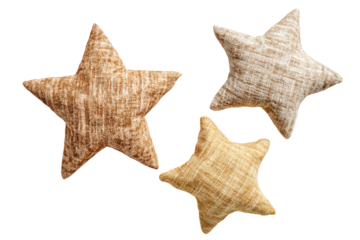 three star shaped pillows on a white background