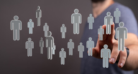 Abstract business concept of a person touching digital figures representing connection and...