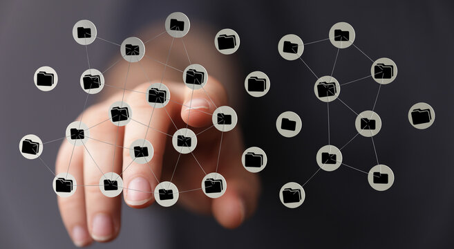 Concept of data protection and digital security. Touch of a finger on a network of folders representing connect