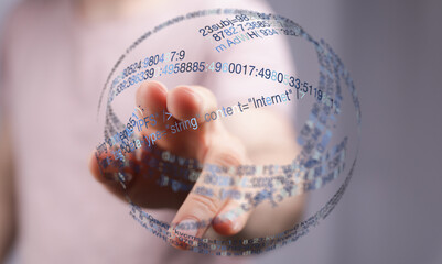 Close-up of a hand holding a data sphere with text elements representing internet and technology concepts. Ideal for technology, data