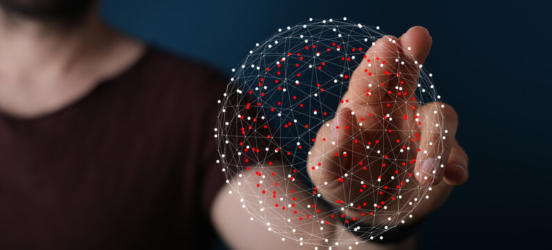 Abstract image of a hand interacting with a digital network sphere, representing technology, connection, and data visualization. Ideal for illus