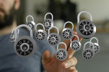 Concept of cybersecurity, data protection, and online safety. Person interacting with floating padlocks, symbol
