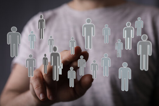 Concept of teamwork, community, and social networking with people icons, indicating unity and connection.