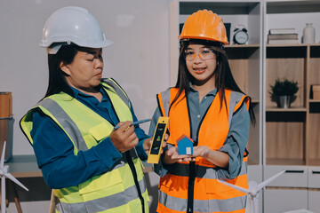 Architects and engineers working collaboratively on construction project