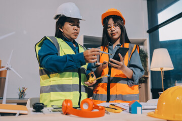 Architects and engineers working collaboratively on construction project