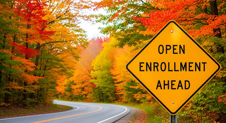 Open enrollment ahead road sign in a colorful autumn forest with a winding road