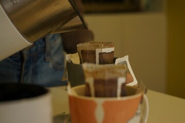 Pouring coffee into a glass