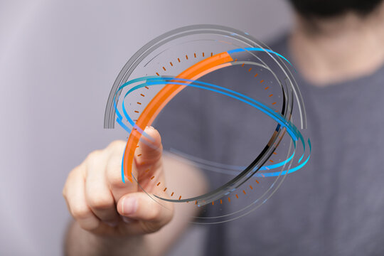 Person's finger interacting with a holographic sphere representing global technology. Concepts include digital transformation, innova - Powered by Adobe