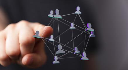 Abstract illustration of a human network with a hand pointing, conveying the ideas of connection,...